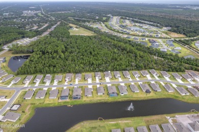 Exquisite 3-Bed, 3-Bath. 3-Car Garage Retreat in Halifax on Halifax Plantation Golf Club in Florida - for sale on GolfHomes.com, golf home, golf lot