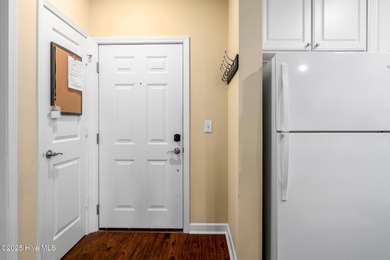 Experience coastal living at its finest in this meticulously on Crow Creek Golf Club in North Carolina - for sale on GolfHomes.com, golf home, golf lot