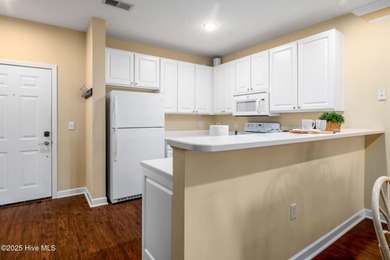 Experience coastal living at its finest in this meticulously on Crow Creek Golf Club in North Carolina - for sale on GolfHomes.com, golf home, golf lot