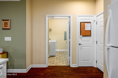 Experience coastal living at its finest in this meticulously on Crow Creek Golf Club in North Carolina - for sale on GolfHomes.com, golf home, golf lot