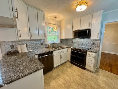 Located just off the 18th fairway off the Henderson Club this on Henderson Country Club in North Carolina - for sale on GolfHomes.com, golf home, golf lot