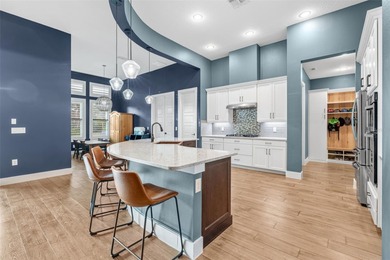 Welcome to 25870 Crossings Bluff Lane-- an exceptional luxury on Red Tail Golf Club in Florida - for sale on GolfHomes.com, golf home, golf lot