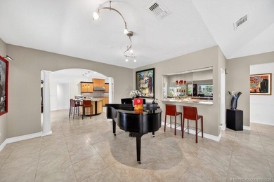 Located within the 24-hour manned, gated Evergreen Club, this on  in Florida - for sale on GolfHomes.com, golf home, golf lot