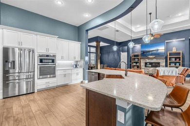 Welcome to 25870 Crossings Bluff Lane-- an exceptional luxury on Red Tail Golf Club in Florida - for sale on GolfHomes.com, golf home, golf lot