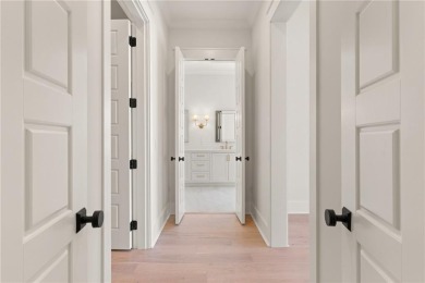 With grays, greens and classic cedar texture, this cottage on Frederica Golf Club in Georgia - for sale on GolfHomes.com, golf home, golf lot