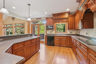 This custom all-brick estate offers rare scale, construction on RedTail Golf Club in Illinois - for sale on GolfHomes.com, golf home, golf lot