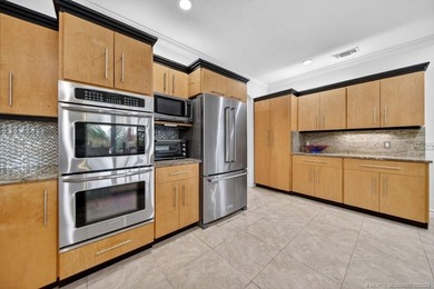 Located within the 24-hour manned, gated Evergreen Club, this on  in Florida - for sale on GolfHomes.com, golf home, golf lot