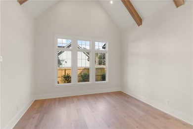With grays, greens and classic cedar texture, this cottage on Frederica Golf Club in Georgia - for sale on GolfHomes.com, golf home, golf lot