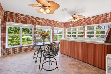 This custom all-brick estate offers rare scale, construction on RedTail Golf Club in Illinois - for sale on GolfHomes.com, golf home, golf lot