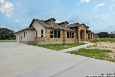 Magnificent custom home with oversized lot on the golf course in on Devine Golf Course in Texas - for sale on GolfHomes.com, golf home, golf lot