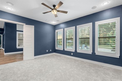 Welcome to 25870 Crossings Bluff Lane-- Nestled on a rare 1 Acre on Red Tail Golf Club in Florida - for sale on GolfHomes.com, golf home, golf lot