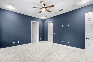 Welcome to 25870 Crossings Bluff Lane-- Nestled on a rare 1 Acre on Red Tail Golf Club in Florida - for sale on GolfHomes.com, golf home, golf lot