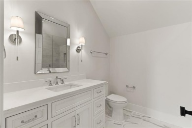 With grays, greens and classic cedar texture, this cottage on Frederica Golf Club in Georgia - for sale on GolfHomes.com, golf home, golf lot