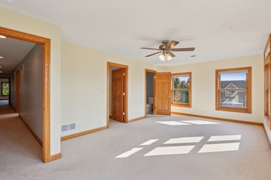 This custom all-brick estate offers rare scale, construction on RedTail Golf Club in Illinois - for sale on GolfHomes.com, golf home, golf lot