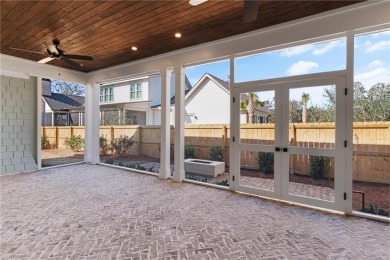With grays, greens and classic cedar texture, this cottage on Frederica Golf Club in Georgia - for sale on GolfHomes.com, golf home, golf lot