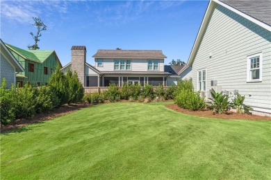 With grays, greens and classic cedar texture, this cottage on Frederica Golf Club in Georgia - for sale on GolfHomes.com, golf home, golf lot