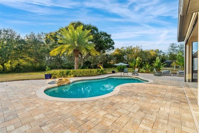 Welcome to 25870 Crossings Bluff Lane-- Nestled on a rare 1 Acre on Red Tail Golf Club in Florida - for sale on GolfHomes.com, golf home, golf lot