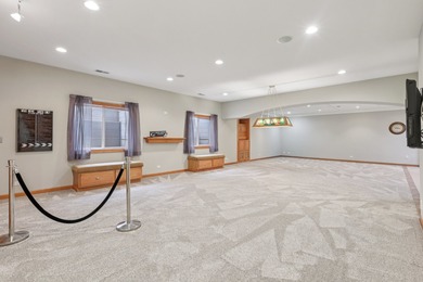 This custom all-brick estate offers rare scale, construction on RedTail Golf Club in Illinois - for sale on GolfHomes.com, golf home, golf lot