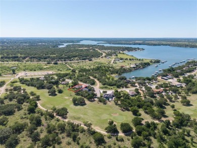 Experience luxury living on the 10th fairway of The Hideout Golf on Hideout Golf Club and Resort  in Texas - for sale on GolfHomes.com, golf home, golf lot
