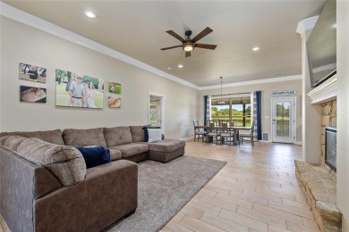 Experience luxury living on the 10th fairway of The Hideout Golf on Hideout Golf Club and Resort  in Texas - for sale on GolfHomes.com, golf home, golf lot