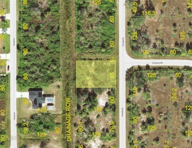 Build your dream home on this spacious vacant lot in peaceful on Duffys Golf Center in Florida - for sale on GolfHomes.com, golf home, golf lot