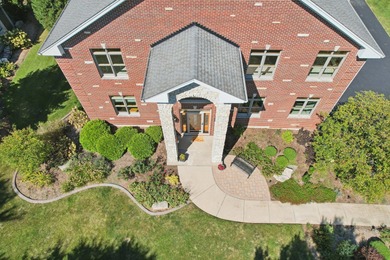 This custom all-brick estate offers rare scale, construction on RedTail Golf Club in Illinois - for sale on GolfHomes.com, golf home, golf lot