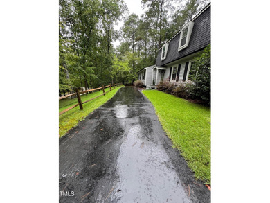 Located just off the 18th fairway off the Henderson Club this on Henderson Country Club in North Carolina - for sale on GolfHomes.com, golf home, golf lot