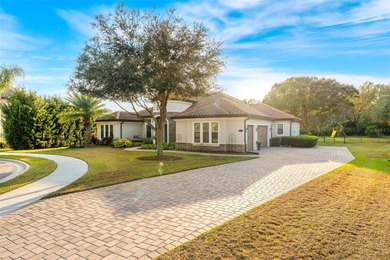 Welcome to 25870 Crossings Bluff Lane-- Nestled on a rare 1 Acre on Red Tail Golf Club in Florida - for sale on GolfHomes.com, golf home, golf lot