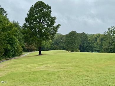 Located just off the 18th fairway off the Henderson Club this on Henderson Country Club in North Carolina - for sale on GolfHomes.com, golf home, golf lot