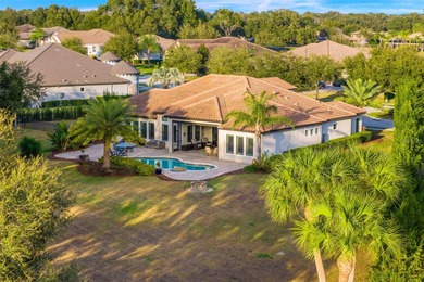 Welcome to 25870 Crossings Bluff Lane-- Nestled on a rare 1 Acre on Red Tail Golf Club in Florida - for sale on GolfHomes.com, golf home, golf lot