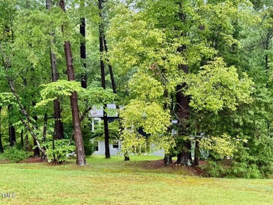 Located just off the 18th fairway off the Henderson Club this on Henderson Country Club in North Carolina - for sale on GolfHomes.com, golf home, golf lot