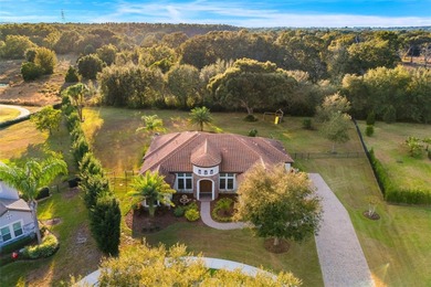 Welcome to 25870 Crossings Bluff Lane-- Nestled on a rare 1 Acre on Red Tail Golf Club in Florida - for sale on GolfHomes.com, golf home, golf lot