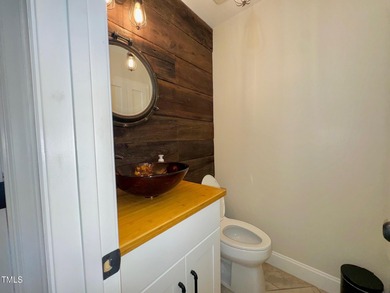 Located just off the 18th fairway off the Henderson Club this on Henderson Country Club in North Carolina - for sale on GolfHomes.com, golf home, golf lot