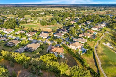 Welcome to 25870 Crossings Bluff Lane-- Nestled on a rare 1 Acre on Red Tail Golf Club in Florida - for sale on GolfHomes.com, golf home, golf lot