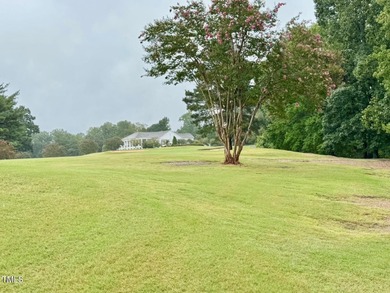 Located just off the 18th fairway off the Henderson Club this on Henderson Country Club in North Carolina - for sale on GolfHomes.com, golf home, golf lot