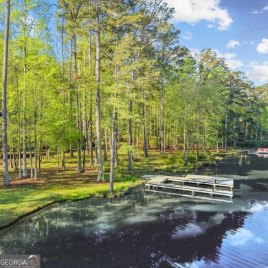 Stunning Lakefront Luxury Home in Reynolds Landing with Sunset on Reynolds Lake Oconee - The Landing in Georgia - for sale on GolfHomes.com, golf home, golf lot