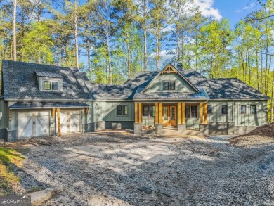 Stunning Lakefront Luxury Home in Reynolds Landing with Sunset on Reynolds Lake Oconee - The Landing in Georgia - for sale on GolfHomes.com, golf home, golf lot