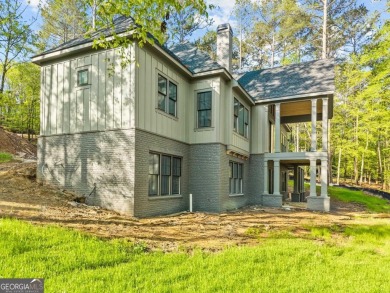 Stunning Lakefront Luxury Home in Reynolds Landing with Sunset on Reynolds Lake Oconee - The Landing in Georgia - for sale on GolfHomes.com, golf home, golf lot
