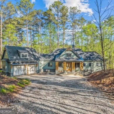 Stunning Lakefront Luxury Home in Reynolds Landing with Sunset on Reynolds Lake Oconee - The Landing in Georgia - for sale on GolfHomes.com, golf home, golf lot