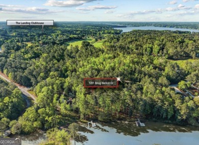 Stunning Lakefront Luxury Home in Reynolds Landing with Sunset on Reynolds Lake Oconee - The Landing in Georgia - for sale on GolfHomes.com, golf home, golf lot