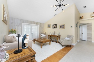 IMMACULATE  FULLY UPDATED, turnkey furnished, waterfront home on Pinemoor West Golf Club in Florida - for sale on GolfHomes.com, golf home, golf lot