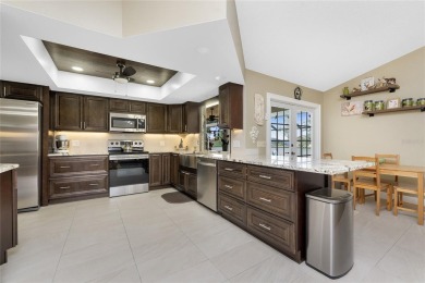 IMMACULATE  FULLY UPDATED, turnkey furnished, waterfront home on Pinemoor West Golf Club in Florida - for sale on GolfHomes.com, golf home, golf lot