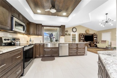 IMMACULATE  FULLY UPDATED, turnkey furnished, waterfront home on Pinemoor West Golf Club in Florida - for sale on GolfHomes.com, golf home, golf lot