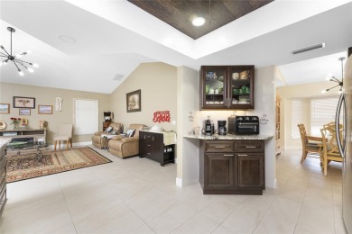 IMMACULATE  FULLY UPDATED, turnkey furnished, waterfront home on Pinemoor West Golf Club in Florida - for sale on GolfHomes.com, golf home, golf lot