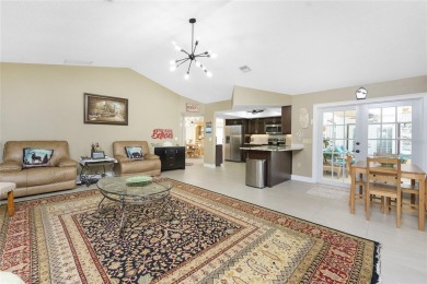 IMMACULATE  FULLY UPDATED, turnkey furnished, waterfront home on Pinemoor West Golf Club in Florida - for sale on GolfHomes.com, golf home, golf lot