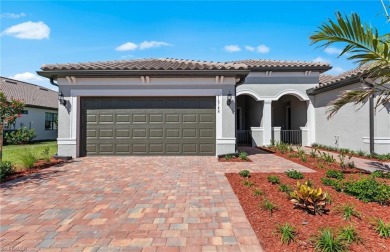 Enjoy low-maintenance, resort-style living in this beautifully on River Hall Country Club in Florida - for sale on GolfHomes.com, golf home, golf lot