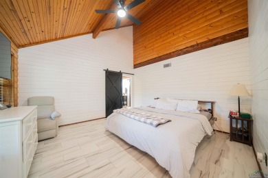 EAST TEXAS DREAM - Fabulous log home with wraparound porches on Southern Hills Golf Club in Texas - for sale on GolfHomes.com, golf home, golf lot
