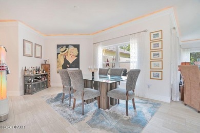 Drenched in natural light and beautifully upgraded throughout on  in Florida - for sale on GolfHomes.com, golf home, golf lot