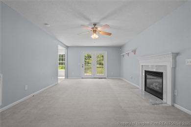 Welcome to Carolina Seasons! This charming 3-bedroom, 2.5-bath on Ponderosa Golf Club in North Carolina - for sale on GolfHomes.com, golf home, golf lot
