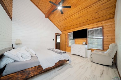 EAST TEXAS DREAM - Fabulous log home with wraparound porches on Southern Hills Golf Club in Texas - for sale on GolfHomes.com, golf home, golf lot